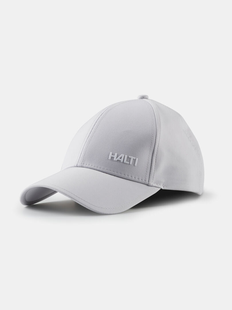 Ljusgrå Halti Mattas Baseball Keps med UPF 50+ och Quick Dry Stretch, HALTI broderat på framsidan.