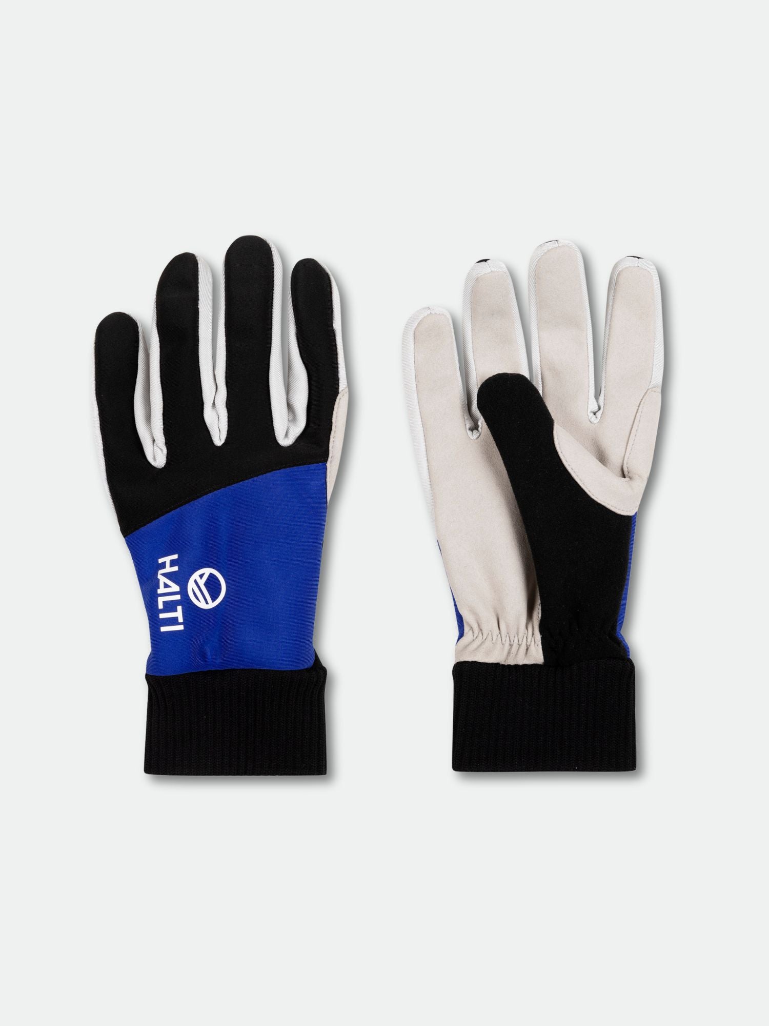 Ett par blå, svarta och vita Halti XC Touring Handskar med ribbade muddar och HAITI tryckt på ena handsken.