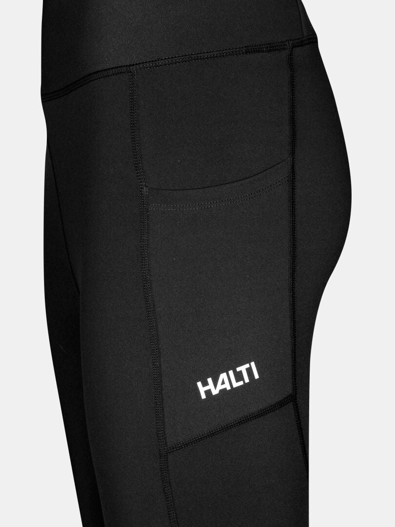 Närbild av Kaldu Träningstights Dam från Halti med en sidoficka och 
