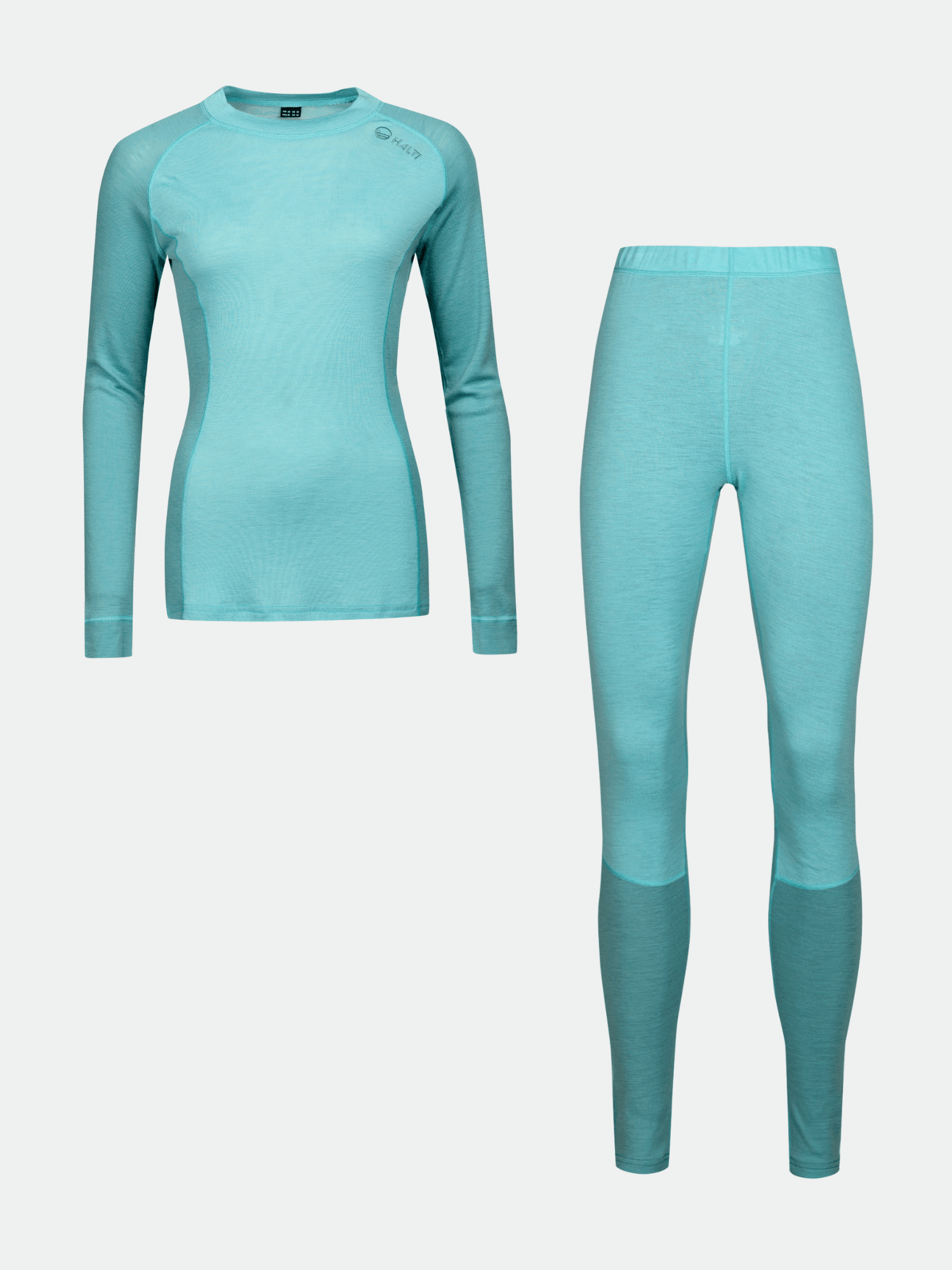 Halti Hossa Merinoull Underställ Set Dam i aquablått, långärmad topp och leggings på en enfärgad vit bakgrund.