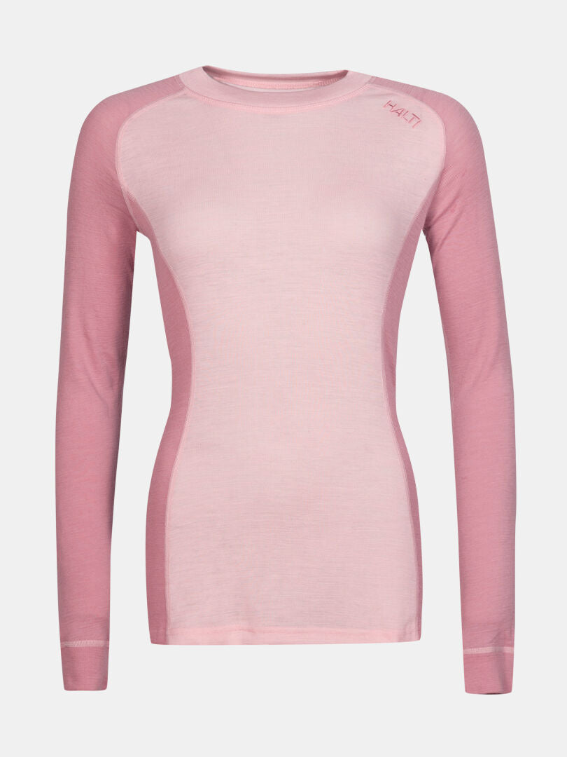 Halti Hossa II Merino underställ set dam är ett ljusrosa, långärmat underställ som passar perfekt för friluftsaktiviteter.